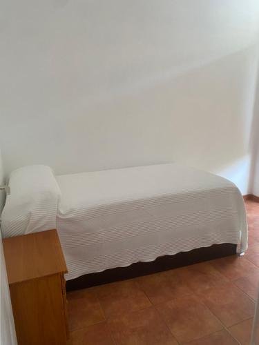 Кровать или кровати в номере Vivienda Vacacional La Candelaria II