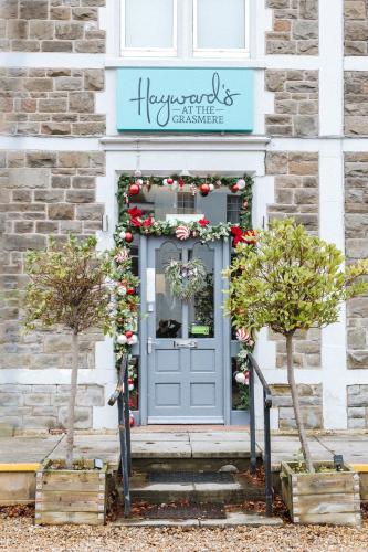 a front door of a house with christmas decorations at Hayward's at the Grasmere in Keynsham