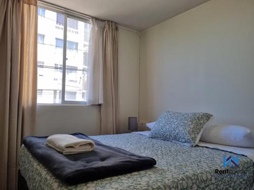 Postel nebo postele na pokoji v ubytování Departamento Corporativo I Talca Norte - RENTCOVAC - Factura Inmediata