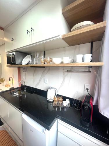 Dapur atau dapur kecil di Suíte Horto