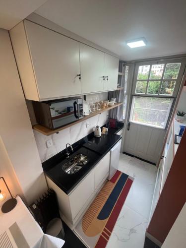 Dapur atau dapur kecil di Suíte Horto