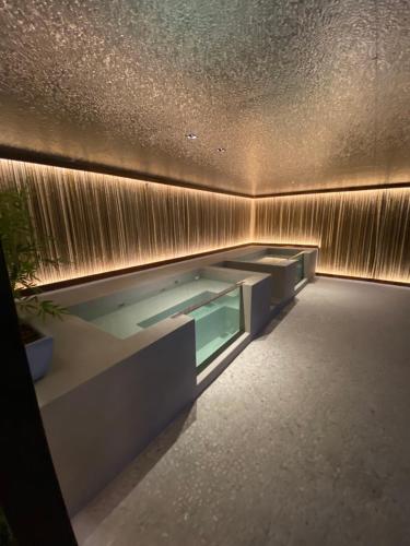 a swimming pool in the middle of a building at New time 1216 in Maceió