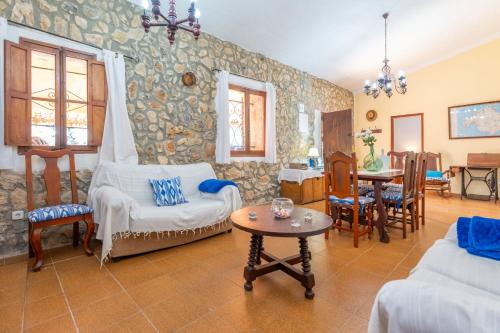 Postel nebo postele na pokoji v ubytování Finca Can Calisto