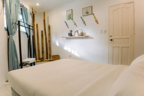 Postel nebo postele na pokoji v ubytování 8 Plus Beach Resort