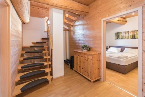 Posteľ alebo postele v izbe v ubytovaní Ski-N-Lake Chalet One