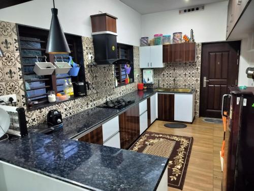 Kuchyň nebo kuchyňský kout v ubytování Roneys Villa