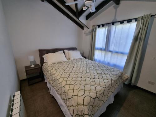 Postel nebo postele na pokoji v ubytování Departamento centrico Mascardi