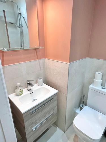 a bathroom with a sink and a toilet at 2 bed Apartment in City Centre in Dublin