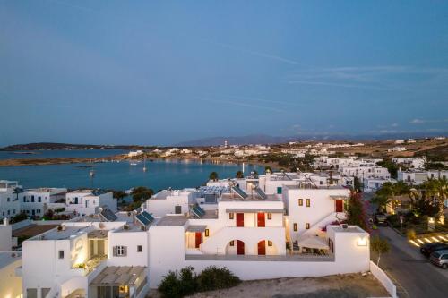 an aerial view of a town with white buildings at Archipelagos Studios in Naousa
