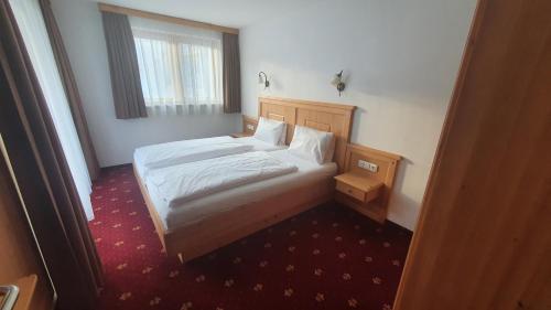 Katil atau katil-katil dalam bilik di Hotel Garni Dorfblick