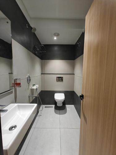 Koupelna v ubytování Hotel Isha Inn