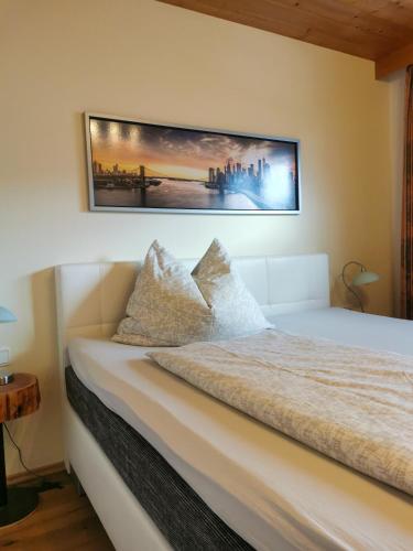 Ένα ή περισσότερα κρεβάτια σε δωμάτιο στο Apartment Aigner