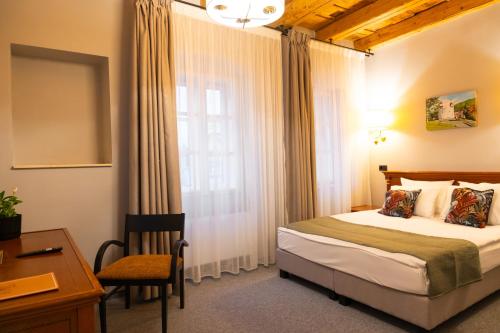 Ένα ή περισσότερα κρεβάτια σε δωμάτιο στο Epic rooms
