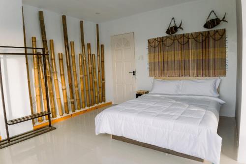 Postel nebo postele na pokoji v ubytování 8 Plus Beach Resort