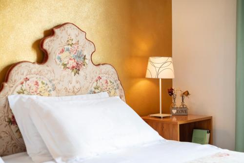 Postel nebo postele na pokoji v ubytování Hotel Parco dei Pini - 100mt dal Mare