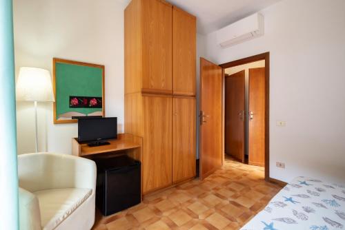 Postel nebo postele na pokoji v ubytování Hotel Parco dei Pini - 100mt dal Mare
