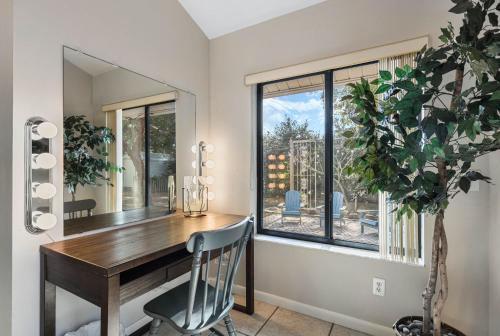 a home office with a desk and a window at Doras Dream, 4 Bedrooms, Sleeps 12, Downtown in Mount Dora