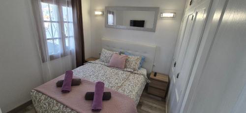 Posteľ alebo postele v izbe v ubytovaní Nice apartment with heating pool.