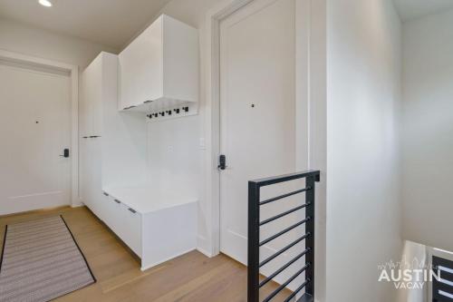 a room with a staircase and a white closet at Modern 3BR 3BA in Steiner Ranch w Balcony Dining Yard w Grill by Austin Vacay in Austin
