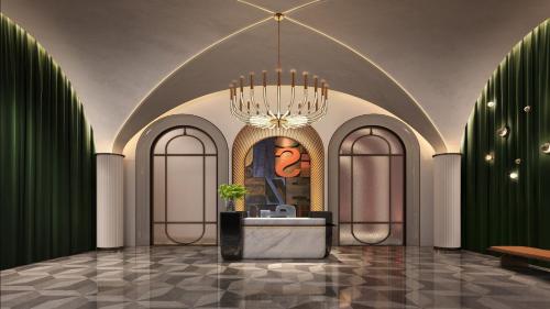 a rendering of a lobby with a chandelier at Hotel Indigo Harbin Central Avenue by IHG in Harbin