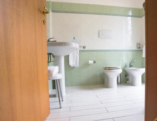 Ванная комната в Hotel Leonardo
