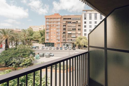 a balcony with a view of a street and buildings at Pio XII Apartments Valencia in Valencia