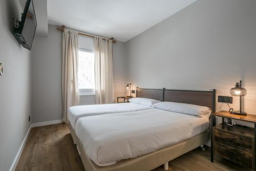 Postel nebo postele na pokoji v ubytování Teso dera Mina by Totiaran