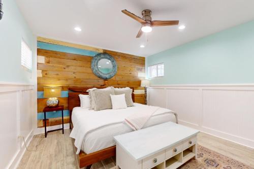 Postel nebo postele na pokoji v ubytování Coral Kai