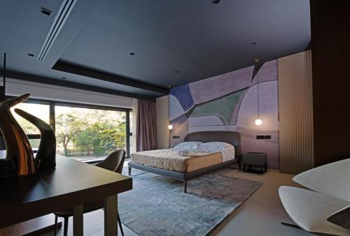 Postel nebo postele na pokoji v ubytování Villa Della Lupa Luxury Rooms