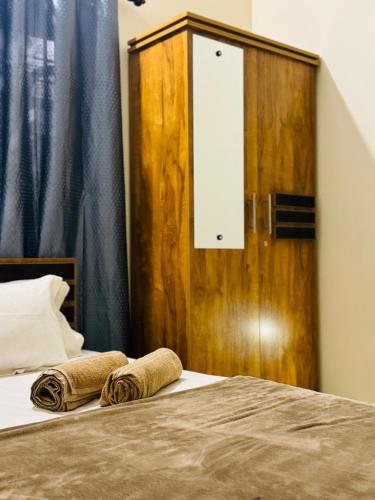 Ένα ή περισσότερα κρεβάτια σε δωμάτιο στο SEA BEE entire villa varkala