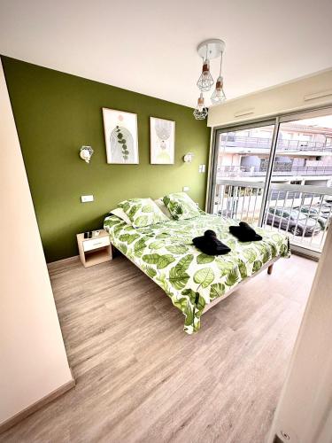 Ένα ή περισσότερα κρεβάτια σε δωμάτιο στο Sphinx de Thau