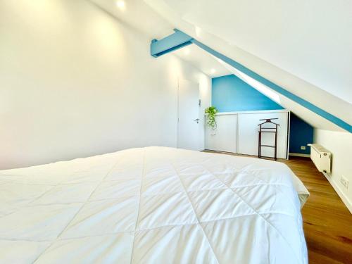 Katil atau katil-katil dalam bilik di Riantec- Ti Gwenvael - Grande Maison avec Baby Foot et Terrain Clos