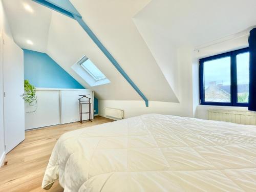 Katil atau katil-katil dalam bilik di Riantec- Ti Gwenvael - Grande Maison avec Baby Foot et Terrain Clos
