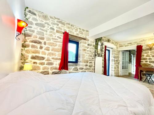 Katil atau katil-katil dalam bilik di Riantec- Ti Gwenvael - Grande Maison avec Baby Foot et Terrain Clos