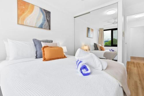 Ένα ή περισσότερα κρεβάτια σε δωμάτιο στο Aquarius Esplanade Retreat