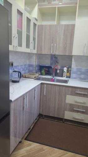 Kuchyň nebo kuchyňský kout v ubytování City Home