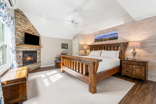 a bedroom with a bed and a fireplace at Inn at Brierley Hill in Lexington