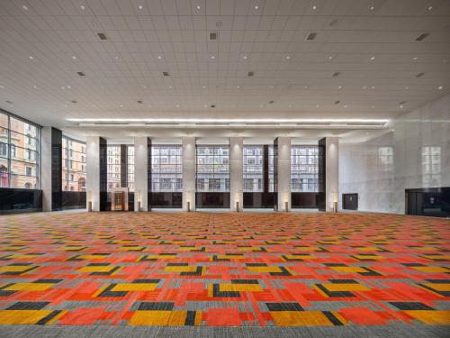 a large room with a large rug on the floor at Loews Philadelphia Hotel in Philadelphia