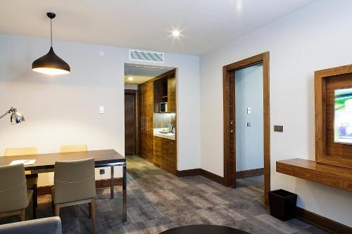 a dining room with a table and chairs at Bof Hotels Business in Istanbul