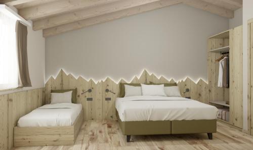 Posteľ alebo postele v izbe v ubytovaní Camping Val di Sole