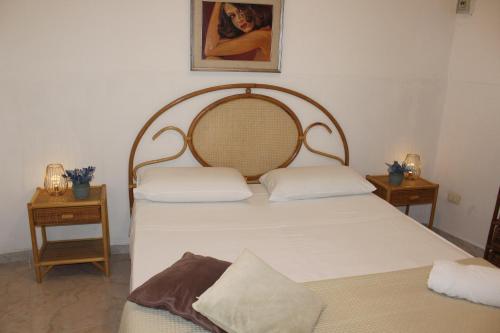 Ένα ή περισσότερα κρεβάτια σε δωμάτιο στο Casa Briseida