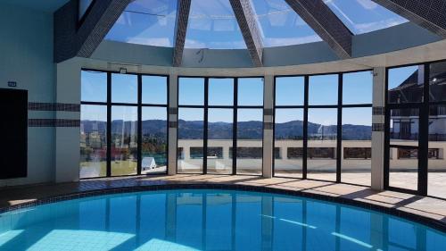 Swimmingpoolen hos eller tæt på Home Green Home - Apto 115