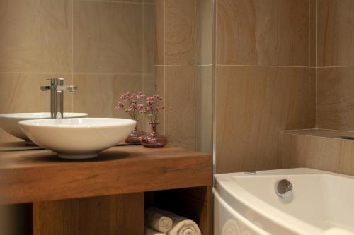 a bathroom with a sink and a toilet at Dimora Margherita in Caserta
