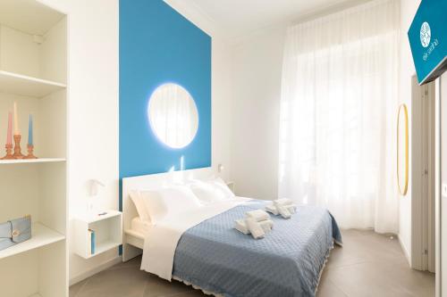 Ένα ή περισσότερα κρεβάτια σε δωμάτιο στο Maddalena Rooms - Eja Sardinia
