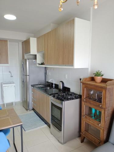 Η κουζίνα ή μικρή κουζίνα στο Apartamento Refúgio das Ondas com Piscina