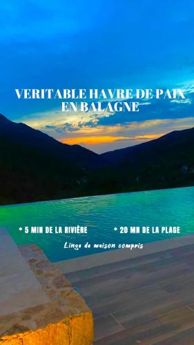 a poster for a concert with a view of the ocean at Gîte A Funtana Montestremo, Balagne, Haute Corse in Manso