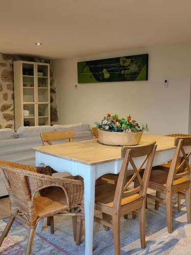 a dining room with a table and chairs at Vale Das 7Lagoas in Geres