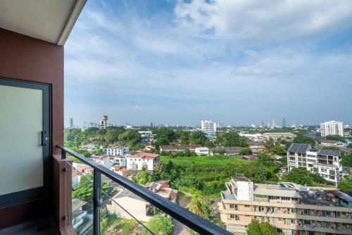 a balcony with a view of a city at Diplomat Suites at Heights Residencies in Narahenpita