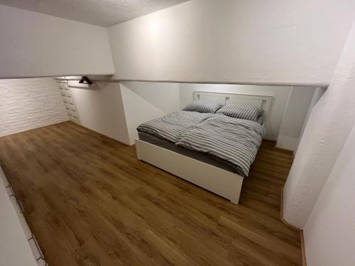 Postel nebo postele na pokoji v ubytování Loft19