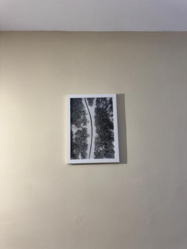 a picture of a tree on a wall at Céntrico apartamento con vistas en Formigal - Entrada 24h sin llaves in Formigal